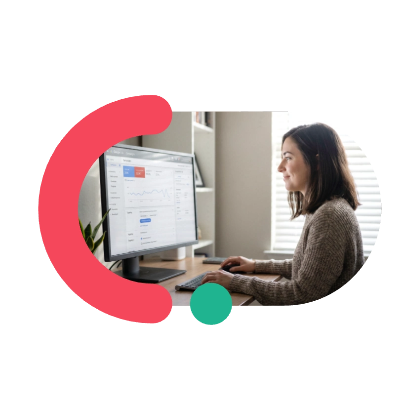 A marketer reviewing live campaign performance on screen